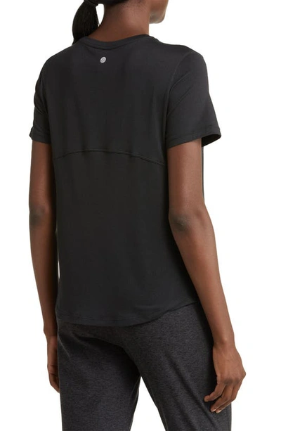 Shop Zella Restore Soft Lite Relaxed Tee In Black