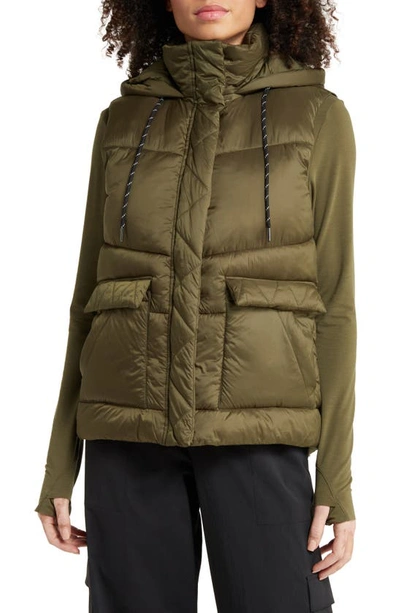 Shop Zella Quilted Hooded Cocoon Vest In Olive Night