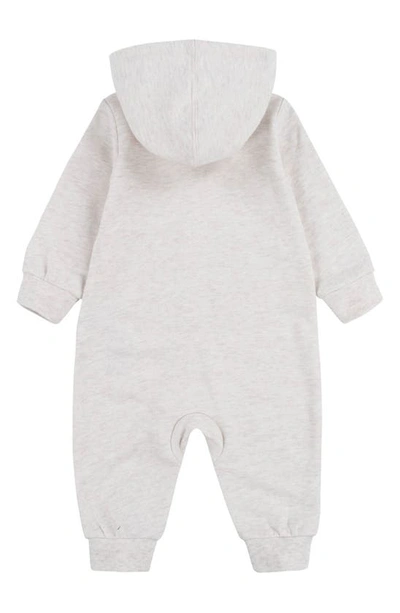 Shop Nike Hooded French Terry Romper In Pale Ivory Heather