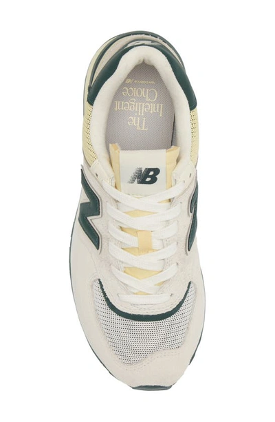 Shop New Balance Gender Inclusive 574 Sneaker In Bright White/ Green