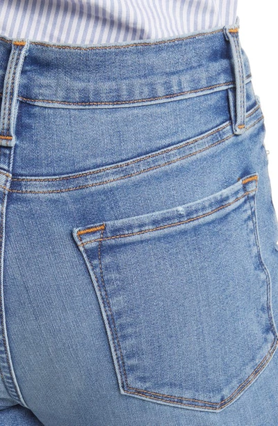 Shop Frame Le Crop Flare Raw Hem Jeans In Morning Blue