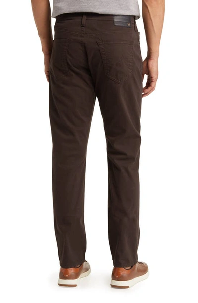 Shop Ag Everett Sueded Stretch Sateen Slim Straight Leg Pants In Rich Carob