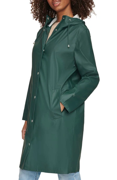 Shop Levi's Water Resistant Hooded Long Rain Jacket In Darkest Spruce
