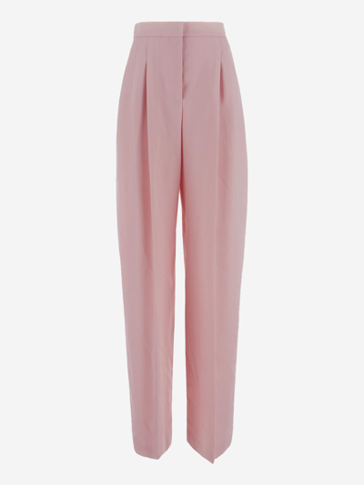 Shop Alexander Mcqueen Wool Trousers In Pink