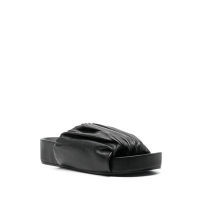 Shop Jil Sander Leather Flip-flops In Black