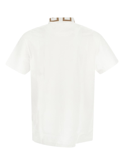 Shop Versace Greca Neck Polo Shirt In White