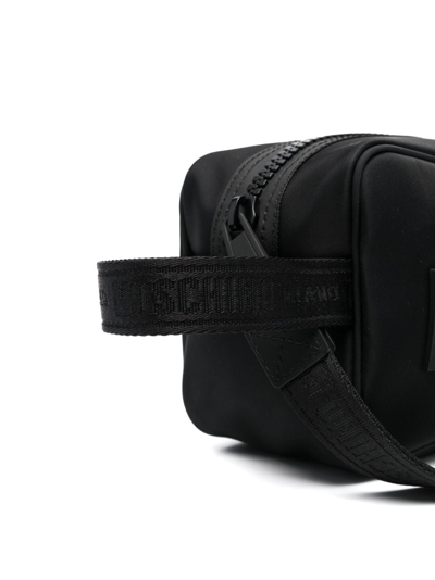 Shop Moschino Logo-print Wash Bag In Black
