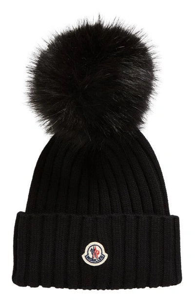 Shop Moncler Virgin Wool Rib Beanie With Faux Fur Pompom In Black