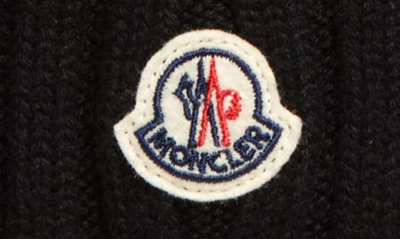 Shop Moncler Virgin Wool Rib Beanie With Faux Fur Pompom In Black