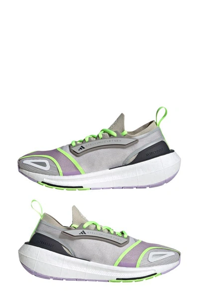 Shop Adidas By Stella Mccartney Ultraboost 23 Running Shoe In Gobi/ Green/ Purple