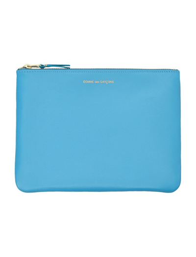 Shop Comme Des Garçons Wallet Logo Embossed Wallet In Blue