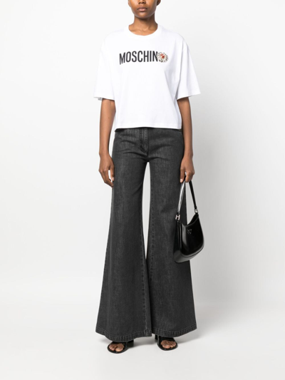Shop Moschino Logo-print Appliqué-detail T-shirt In White