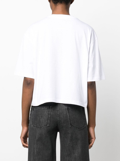 Shop Moschino Logo-print Appliqué-detail T-shirt In White
