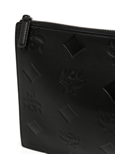 Shop Mcm Aren Monogram Leather Clutch Bag In Black