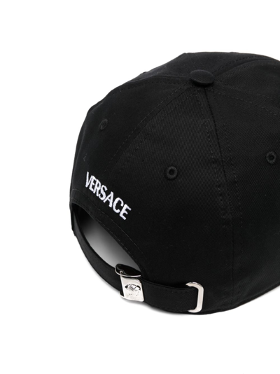 Shop Versace Logo-embroidered Cotton Baseball Cap In Black