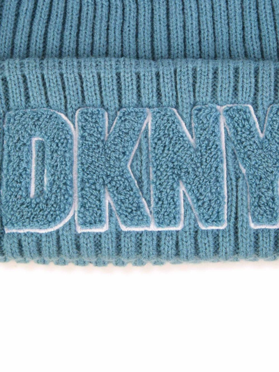 Shop Dkny Logo-patch Ribbed Beanie In Blue