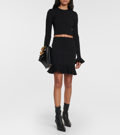 Shop Jw Anderson Ruffled Ribbed-knit Miniskirt In Black