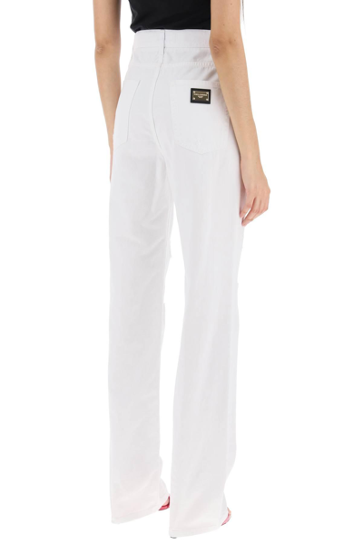 Shop Dolce & Gabbana Destroyed-effect Jeans In White