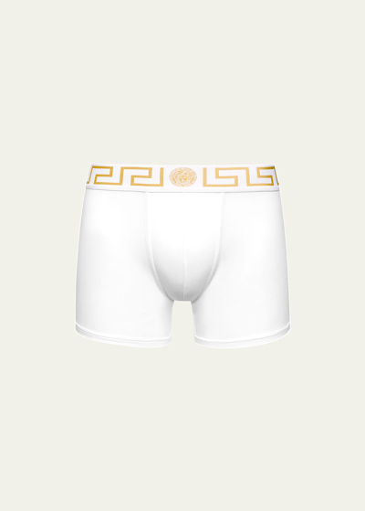 Shop Versace Greca Border Long Boxer Trunks In White Pattern