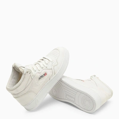 Shop Autry Medalist Mid Sneakers In In White