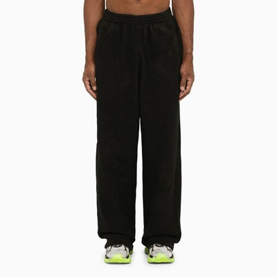 Shop Balenciaga Washed Wide Trousers In Black