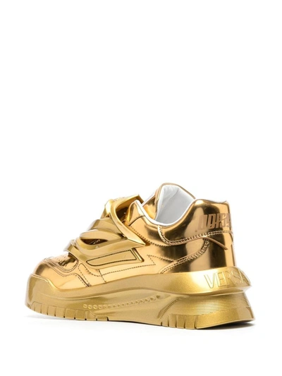 Shop Versace Sneakers In Golden