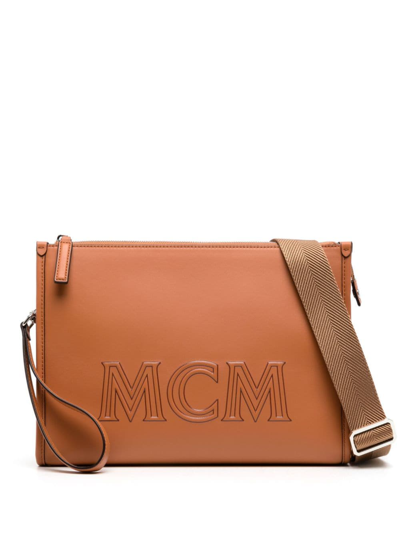 Shop Mcm Large Aren Embossed-logo Crossbody Pouch In Brown