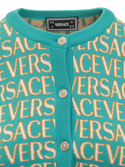 Shop Versace Cardigan With Logo All-over In Turquoise-azzurro