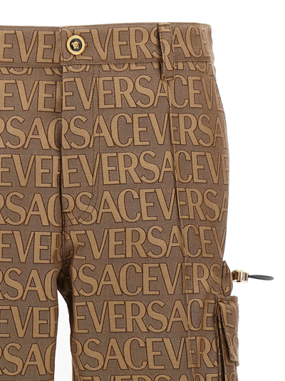 Shop Versace Allover La Vacanza Caspule Pants In Brown