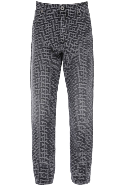 Shop Balmain Jeans With Monogram Motif All-over In Noir Delave (grey)