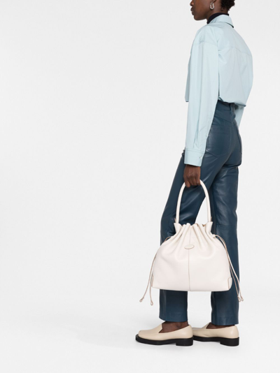 Shop Tod's Logo-appliqué Leather Bucket Bag In Neutrals