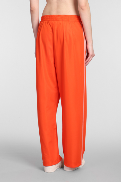 Shop Y-3 Pants In Orange Polyester