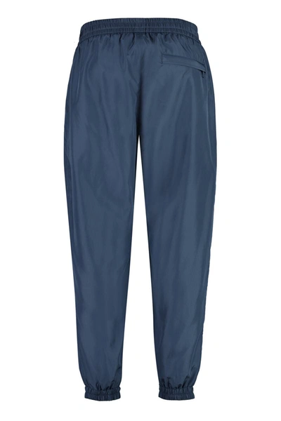 Shop Dolce & Gabbana Logo Detail Nylon Track-pants In Blue