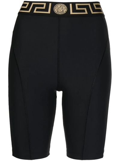 Shop Versace Shorts Sportivi Con Greca In Black
