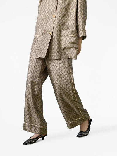 Shop Gucci Gg Supreme Silk Pallazzo Trousers In Brown
