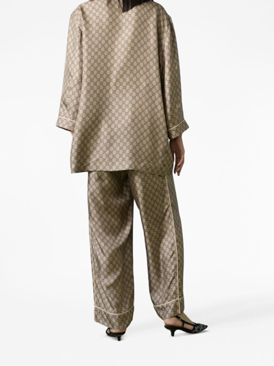 Shop Gucci Gg Supreme Silk Pallazzo Trousers In Brown