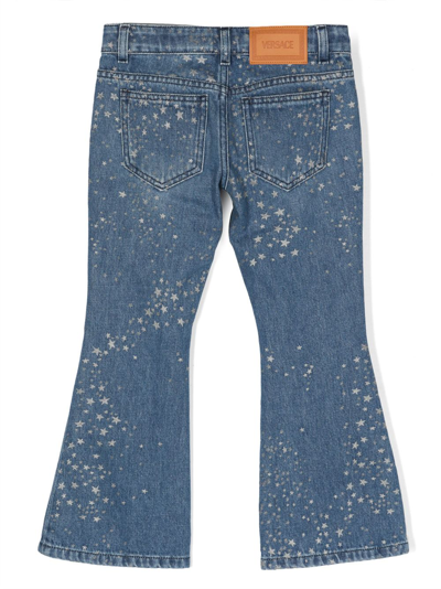 Versace Star-print Flared Denim Trousers In Blue