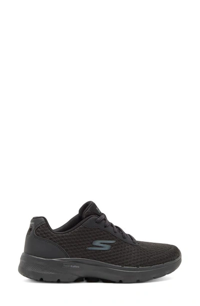 Shop Skechers Go Walk 6™ In Black