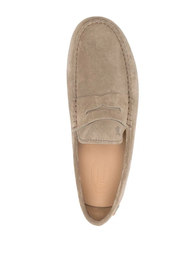 Shop Tod's Gommini Nubuck Driving Shoes In Beige