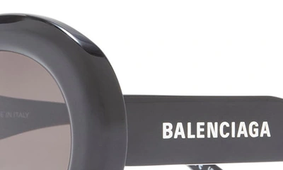 Shop Balenciaga 50mm Round Sunglasses In Black Black Grey