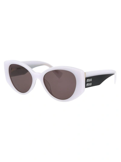 Shop Miu Miu Sunglasses In 05x05p White Opal