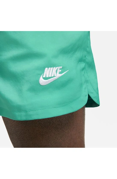 Shop Nike Woven Lined Flow Shorts In Clear Jade/ White
