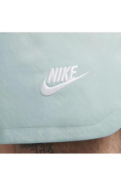 Shop Nike Woven Lined Flow Shorts In Mineral/ White