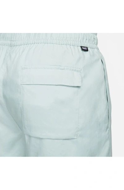 Shop Nike Woven Lined Flow Shorts In Mineral/ White