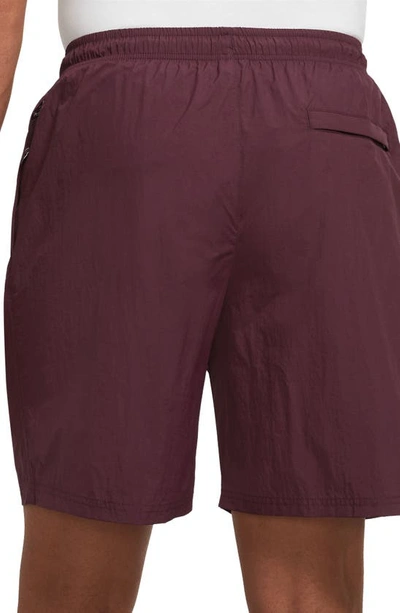 Shop Nike Solo Swoosh Water Repellent Nylon Shorts In Night Maroon/ White