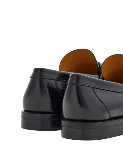 Shop Ferragamo Gancini Leather Loafers In Black