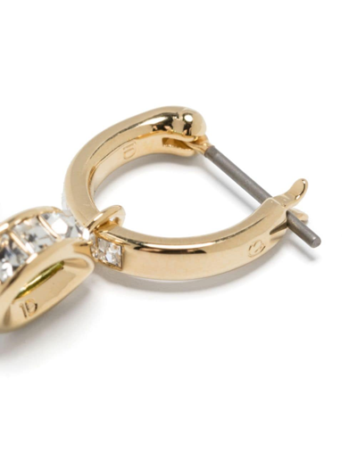 Shop Swarovski Stilla Mini Hoop Earrings In Gold