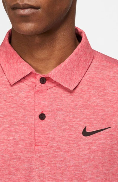 Shop Nike Dri-fit Heathered Golf Polo In Ember Glow/ Black