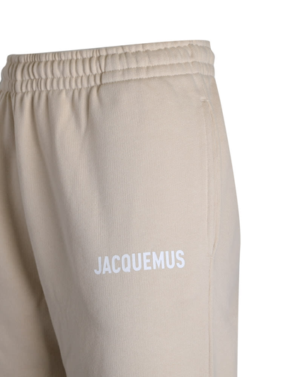 Shop Jacquemus Logo-print Organic Cotton Track Pants In Light Beige