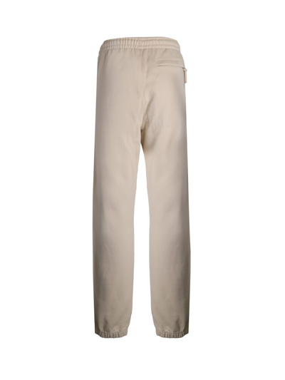Shop Jacquemus Logo-print Organic Cotton Track Pants In Light Beige
